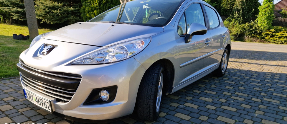 Peugeot 207 cena 16800 przebieg: 129107, rok produkcji 2010 z Bełchatów małe 407